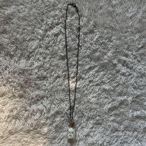 whimsical drink me necklace